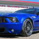 Illustration for article titled Your chance to purchase a Ford Mustang with the V12 heart of an Aston Martin